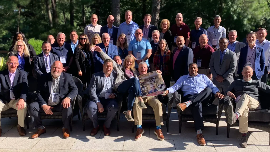 Corporate group celebrating Escape Case outdoors in Cary, a Raleigh suburb