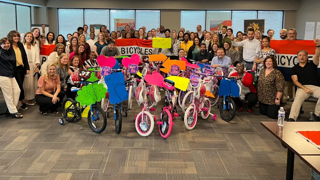 Corporate team with decorated bikes during Bike Building in Durham
