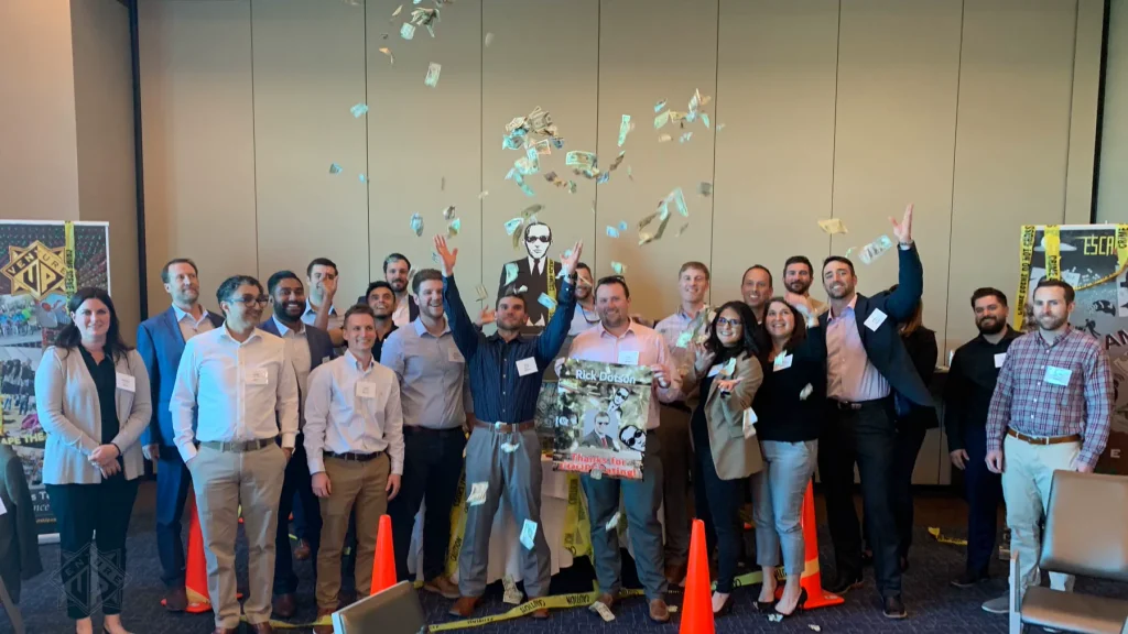 Corporate group celebrating Escape Case with flying cash in Houston
